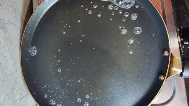 Spreading Savory Vegetable Pancake Batter on Hot Non-Stick Pan