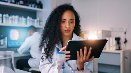Healthcare, science and woman in lab on tablet for medical review, clinical trial and vaccine...