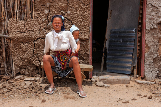 Basarwa San Mother and Child in the Kalahari Desert indigenous Southern African hunter-gatherer culture