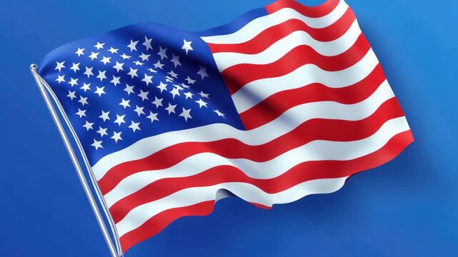 A vibrant red, white, and blue American flag waving with the wind, set against a blue sky background.
