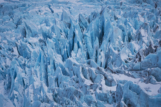 View of the sharp blue ice peaks and deep crevasses of the Falljokull glacier tongue Sveitarfelagid Hornafjordur, Iceland.