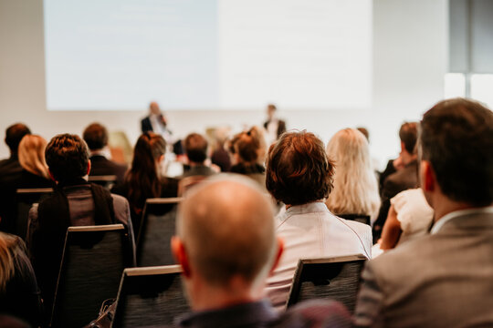 Interview and round table discussion at business convention and presentation. Audience at the conference hall. Business and entrepreneurship symposium.