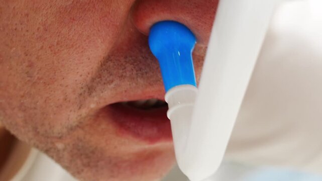 Man uses nasal irrigation for health practice
