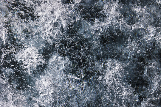View of the intricate crystalline structures and deep blue patterns of the Svinafellsjokull glacier ice Sveitarfelagid Hornafjordur, Iceland.