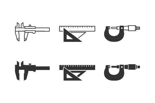 Precision measuring tools collection: caliper, ruler, micrometer.