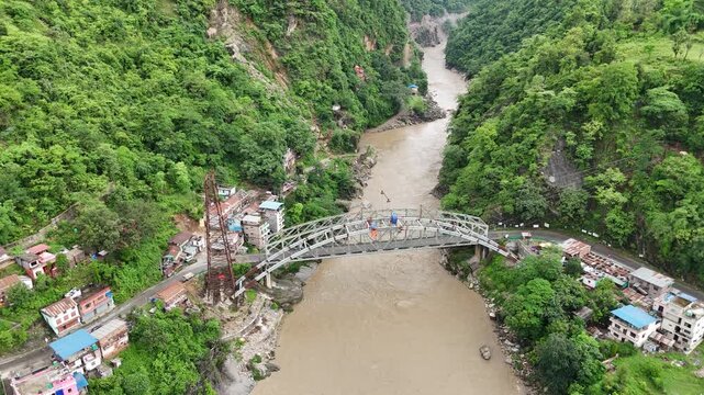 Cinematic Drone Shot of Major Highway Bridge in Nepal Between Green Hills 4K