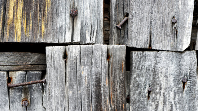 Wooden texture old boards. vintage boards and old rusty nails. Abstract texture of old boards. the wood is destroyed. wood texture. knots, imperfect surface. background