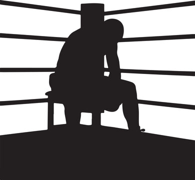 Silhouette of a boxer in a corner reflecting defeat and exhaustion