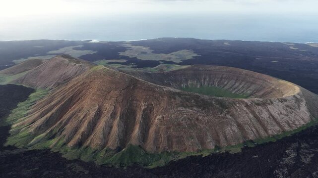 Soaring above Lanzarote's volcanic caldera landscape
