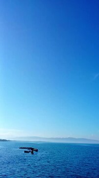 Sea, island, mountains. Time lapse