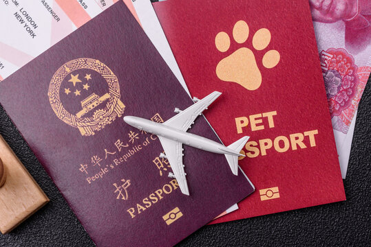 China, Chinese passport with money and flight tickets. Chinese passport