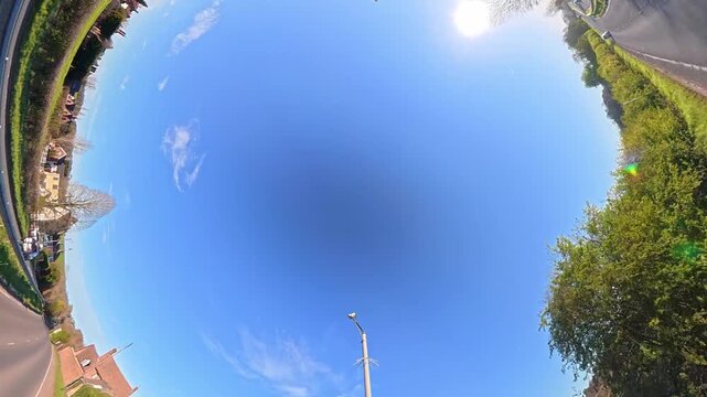 Unique And Ultra Wide Footage of Road Travel Over British Roads and Streets View During Solid Blue Sky with Few Clouds over UK