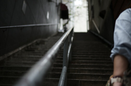 young man walking on the stairs