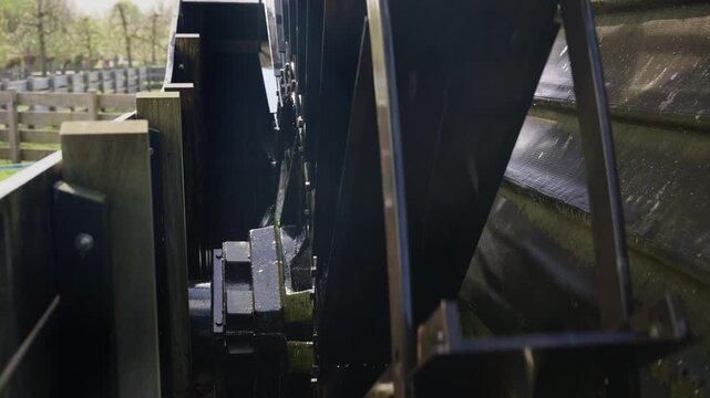 Rotating Scoop Wheel for Water Management