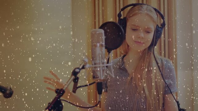 Singer starting vocal take at mic singing adjusting phones shaping phrasing with falling-particles