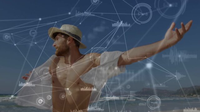 Man turning, strolling beach while sunlight triggers tech HUD showing motion data on flowing shirt