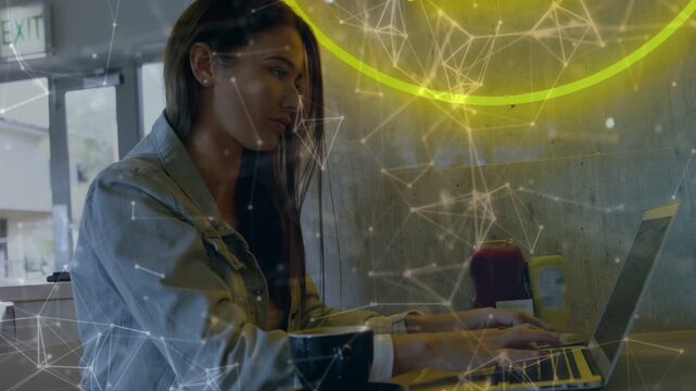 Woman placing hands on keys, typing, working tech in cafe, laptop, neon overlay growing around her