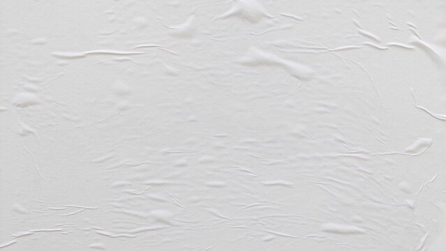 Abstract blank background of wrinkled white paper poster. Soft folds and creased texture with wavy surface pattern.