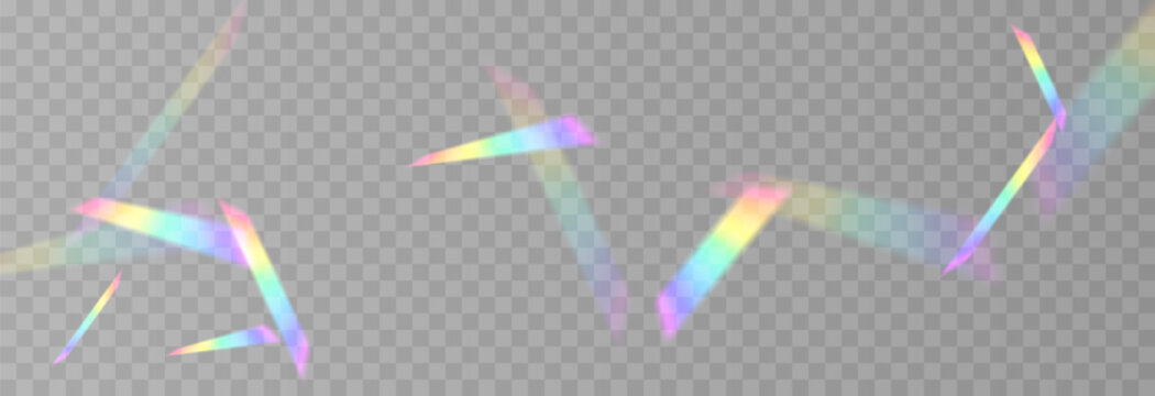 Falling holographic confetti. Shiny rainbow confetti PNG. Falling streamers or tinsel on an isolated transparent background.