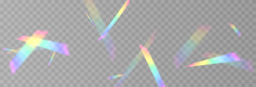 Falling holographic confetti. Shiny rainbow confetti PNG. Falling streamers or tinsel on an isolated transparent background.