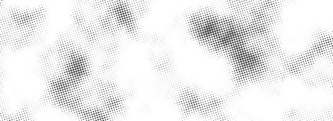 Bold black and white halftone dot rays forming a striking burst, perfect for promotional and branding designs. © devi