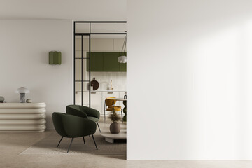 Modern minimal living room with green accents and bright open interior view. © ImageFlow