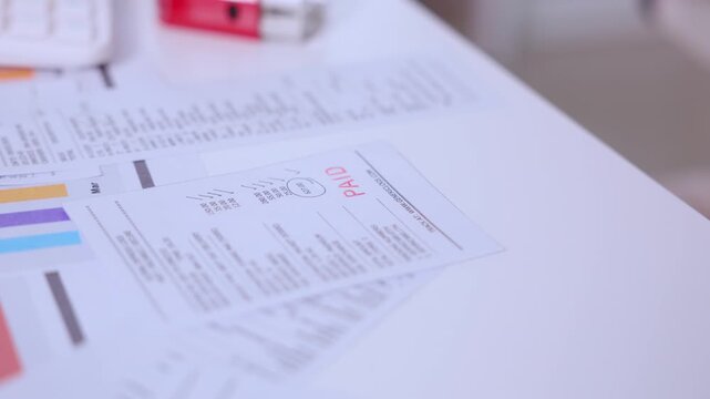 Medical document prescription pharmacy paper healthcare insurance closeup form record on desk, business invoice report paperwork, hand stamp approval on office paper document for finance tax filing