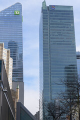 Naklejka premium turret at St. Andrew's Presbyterian Church with towering TD Terrace and RBC Centre, on Simcoe St and Wellington St W, Toronto