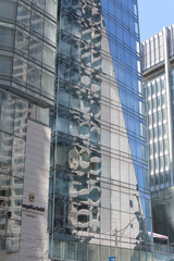 Fototapeta premium windows with mirror reflection on the exterior of Shangri-La, a five-star hotel, located at 188 University Av, Toronto