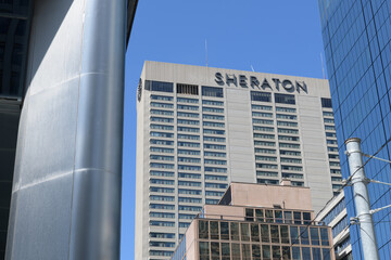 Fototapeta premium Sheraton Centre hotel sign on south-facing elevation of 123 Queen St W, Toronto