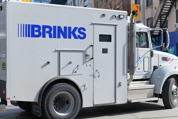 Naklejka premium exterior of a Brinks truck, a heavy-metal armored bubble that moves from A to B in Toronto