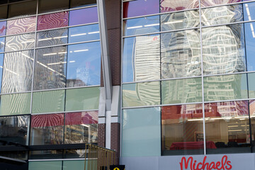 Fototapeta premium exterior of RioCan Hall with sign of Michaels, a craft store chain, located at 142 John St, Toronto