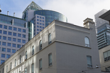 Fototapeta premium looking southwest on Duncan St to Metro Hall and old brick building at 274 King St W (west tower of FORMA condo development), Toronto