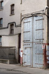 Obraz premium historic stacked double doors, Pearl St, rear of Royal Alexandra Theatre (located at 260 King St W), Toronto
