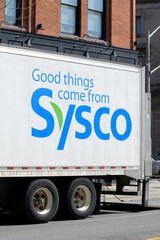 Naklejka premium exterior logo sign on side of delivery truck of Sysco Corporation, a major U.S. foodservice distributor, in Toronto