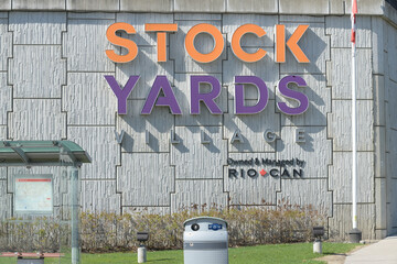 Naklejka premium channel lettering sign at Stock Yards Village, a shopping mall, located at 30 Weston Rd, Toronto
