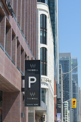 Naklejka premium exterior building detail of The Well, a mixed use complex at 486 Front St W, Toronto - parking entrance