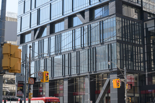 exterior building facade and sign of CIBC bank branch at 460 University Av (at Dundas St W), Toronto