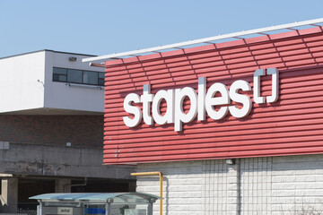 Fototapeta premium sign on the exterior of Staples, an office supply store, located here at 542 Keele St, Toronto