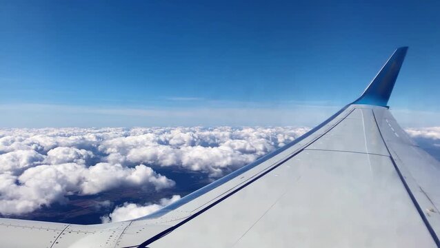 cloudscape skyline view from airplane window seat