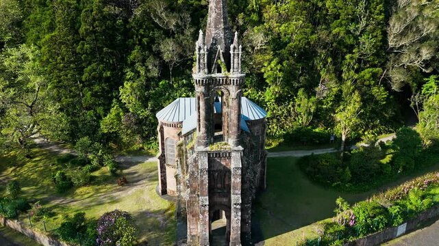 Aerial drone view Capela de Nossa Senhora das Vitorias old church chapel by the lake Furnas, Azores