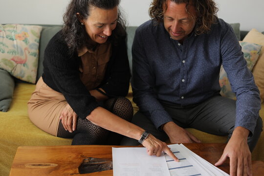Couple Reviewing Documents Together