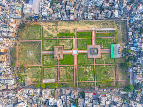 Dhaka, Bangladesh - 08 March 2026: Aerial view of Lalbagh Fort with its symmetrical gardens, historic structures, and surrounding dense urban architecture.