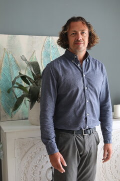 Man in Blue Button-Down Shirt
