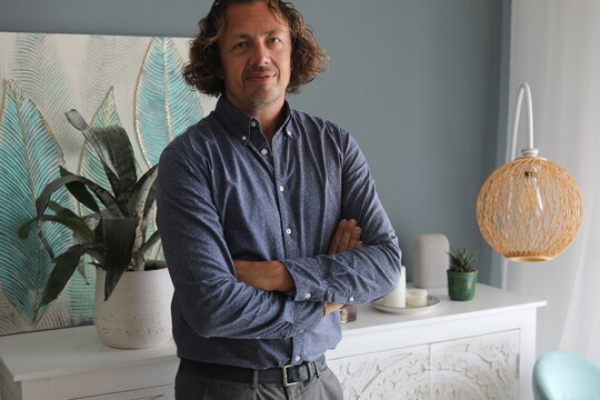 Man With Crossed Arms Indoors