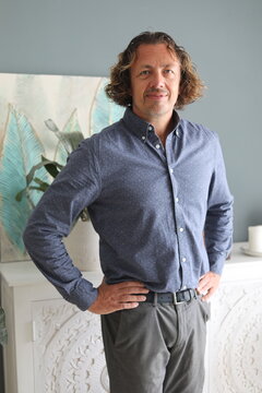 Man with Curly Hair Posing