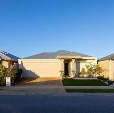 modern suburban house on small block seen from the street