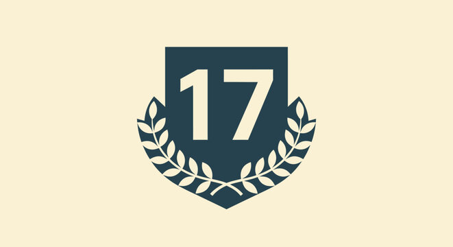 Shield Emblem Design with Number 17 and Laurel Wreath on Isolated Bright Background