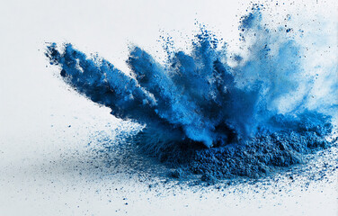 Obraz premium A vibrant explosion of azure powder and cerulean watercolor pigment captured in a flat lay composition. The brilliant blue particles scatter dynamically against a pristine white backdrop.