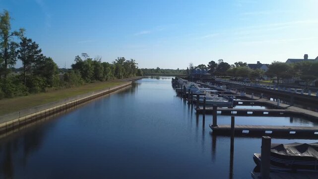 Calm morning at the marina, flyby aerial video